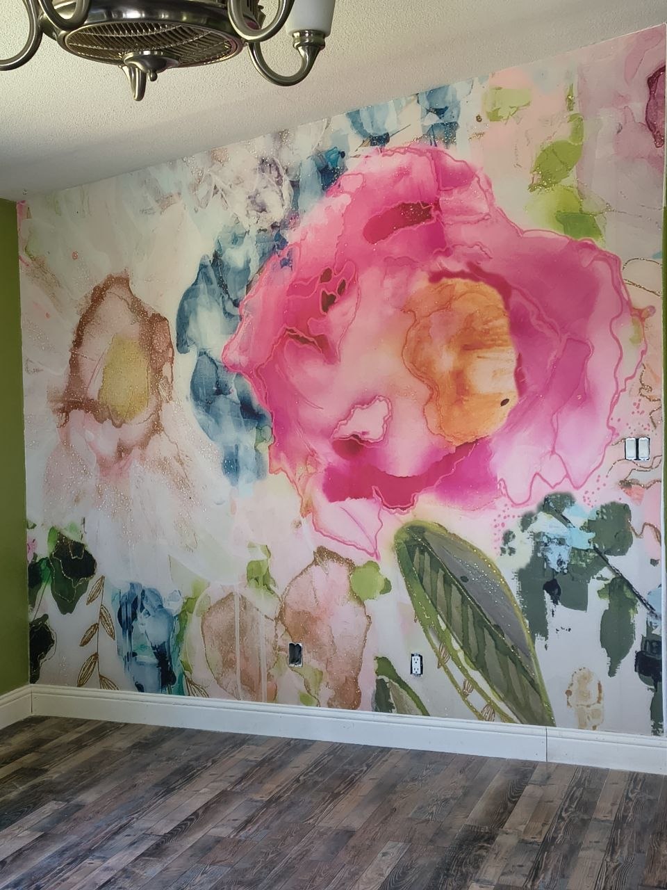 Patterned wallpaper applied and aligned on the finished wall